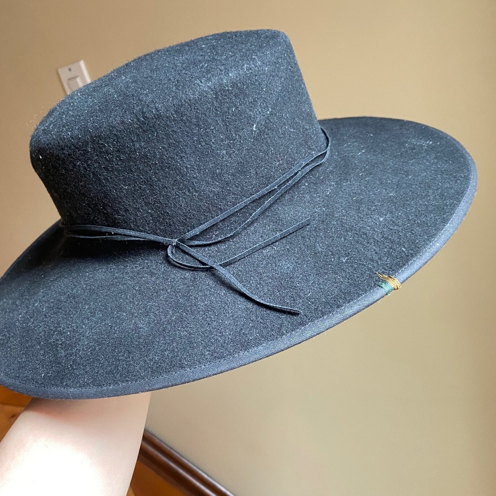 Felt wide brim hat with green and gold accent